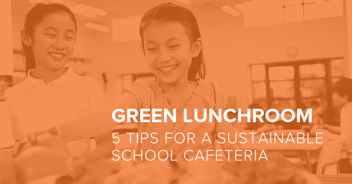 green lunchroom two girls in the school lunch line and smiling